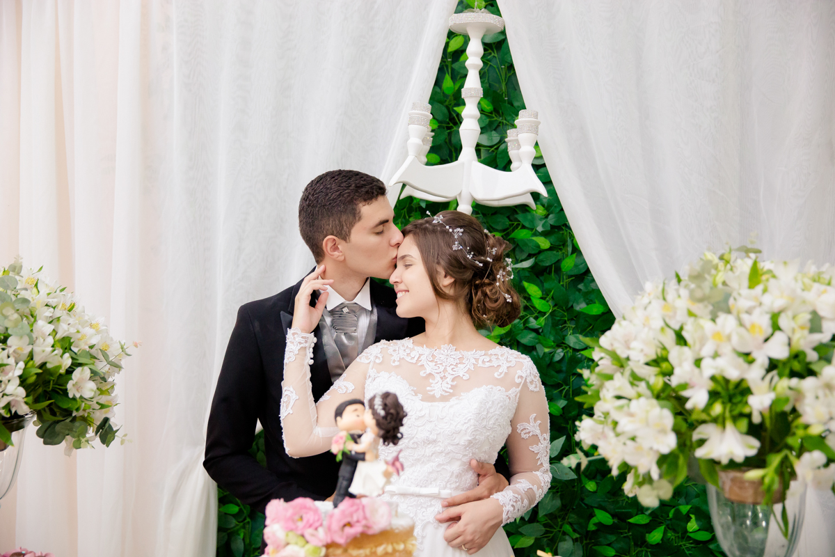 Sessão de fotos na mesa do bolo