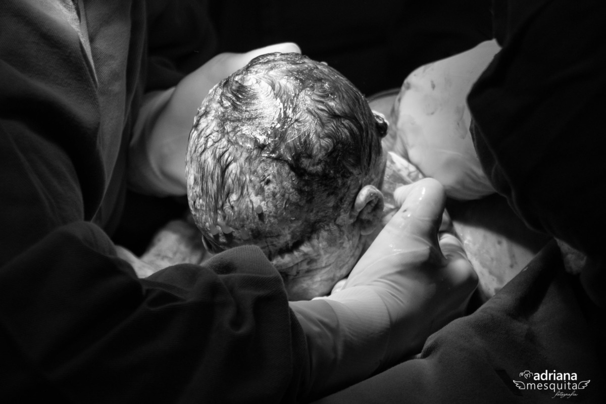 Fotografa Adriana Mesquita registrando o parto do Luis Gustavo