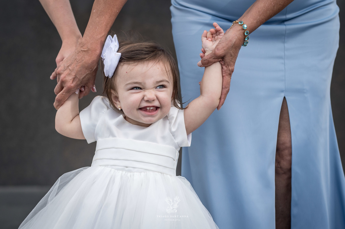 Noivos com sua filha aos pés do cristo redentor