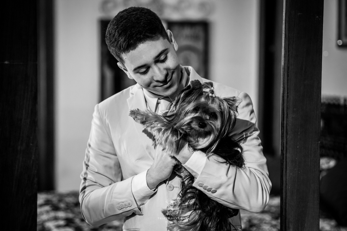 Making of do noivo segura cadelinha preto e branco