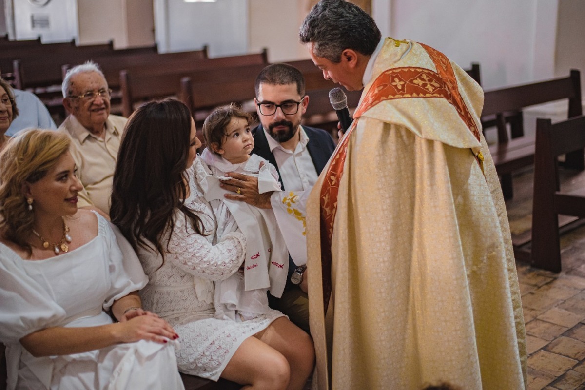 Momento  de unção no batismo