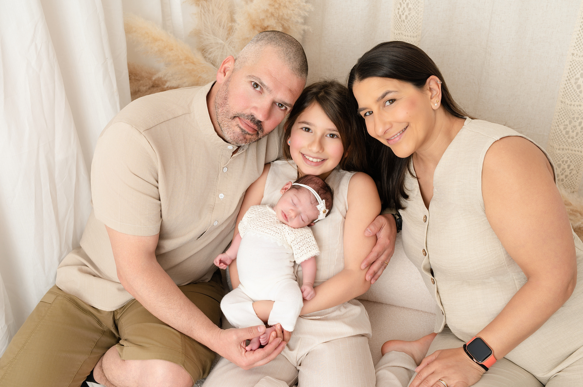 Sessão newborn com família