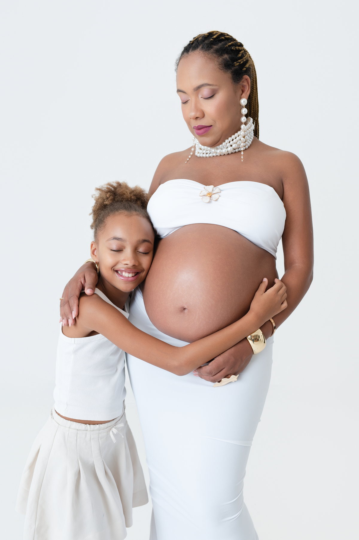 Fotografia de grávida com a filha no Algarve