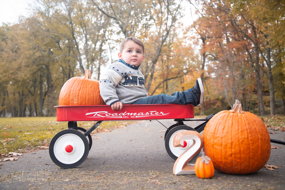 Kids boy 2 years photo fall 
pumpkin wagon