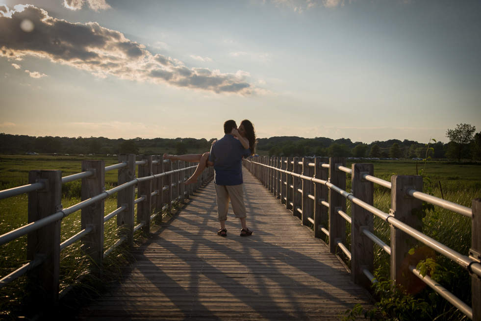 
photo of couple on the beach in red dress Milford CT