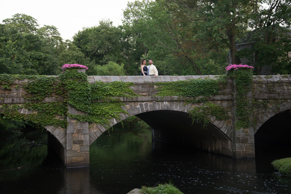
photo of couple on the beach in Milford CT bridge