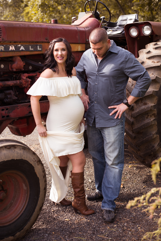 maternity pic farm red bar mother and father funny Connecticut
 maternity photographer in ct