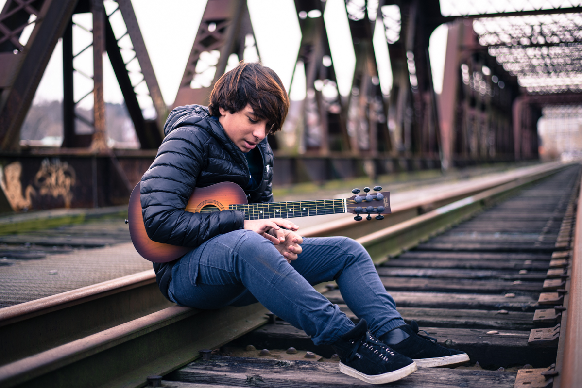 boy teenage 16 years  guitar photography bridge train Connecticut