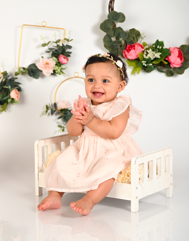 girl smash cake photo shoot white background flowers little bed one
kids photographer in CT