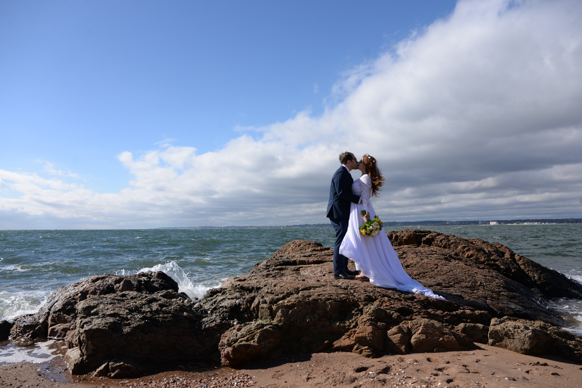 wedding bride and groom lighthouse beach flash Connecticut 