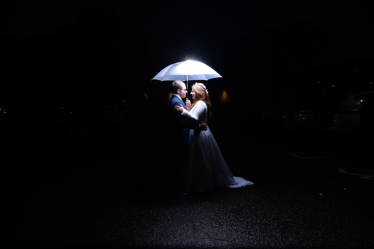 wedding bride and groom umbrella flash Connecticut photo