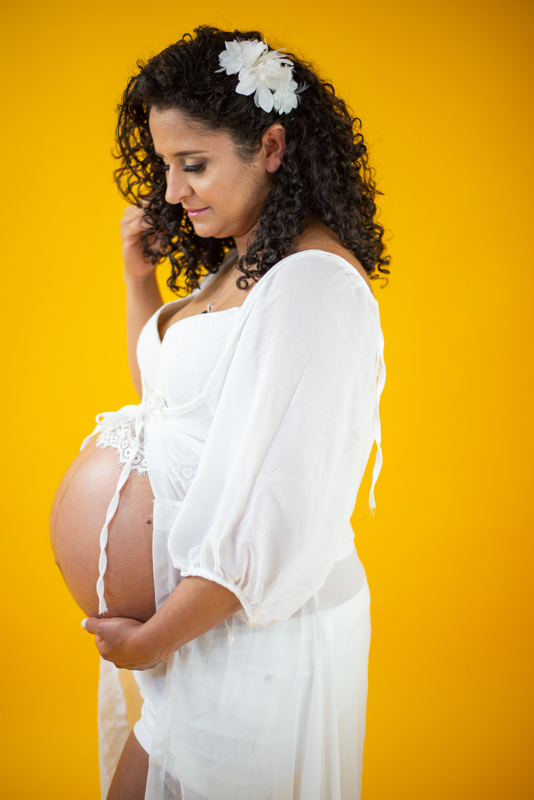 pregnancy photoshoot white dress  Trumbull Ct
studio photo
 maternity photographer in ct