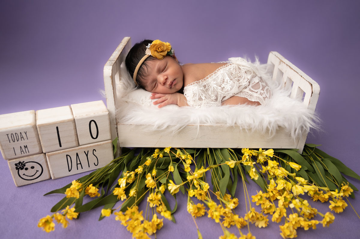 newborn photo
bed
purple background girl 
Vanessa Trettel Photography
Ansonia, CT