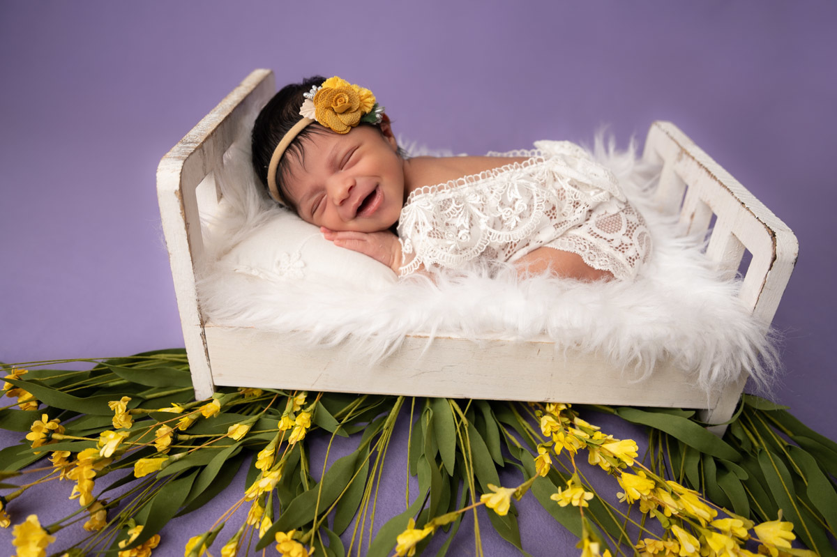 newborn photo
bed prop big smile
purple background girl 
Vanessa Trettel Photography
Ansonia, CT