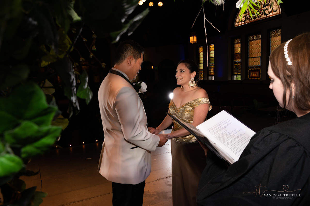 Wedding photo
golden wedding dress
orchid bouquet
groom and  bride
Trinity-on-Main Theater in New Britain, CT
Vanessa Trettel Photography