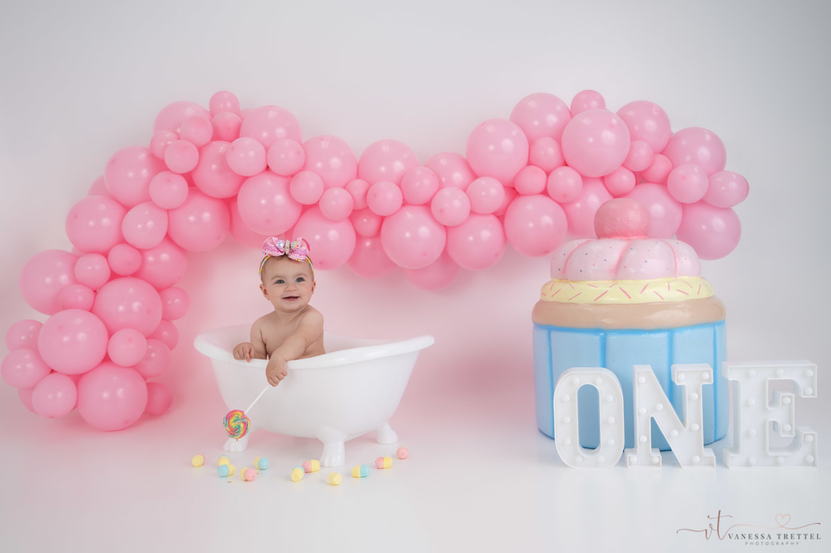 first year photographer
cake smash photography
Girl 1st birthday in the studio
smash cake butterfly decor idea
Vanessa Trettel Photography
pink balloon garland
candy one year decor
baby photographer in CT