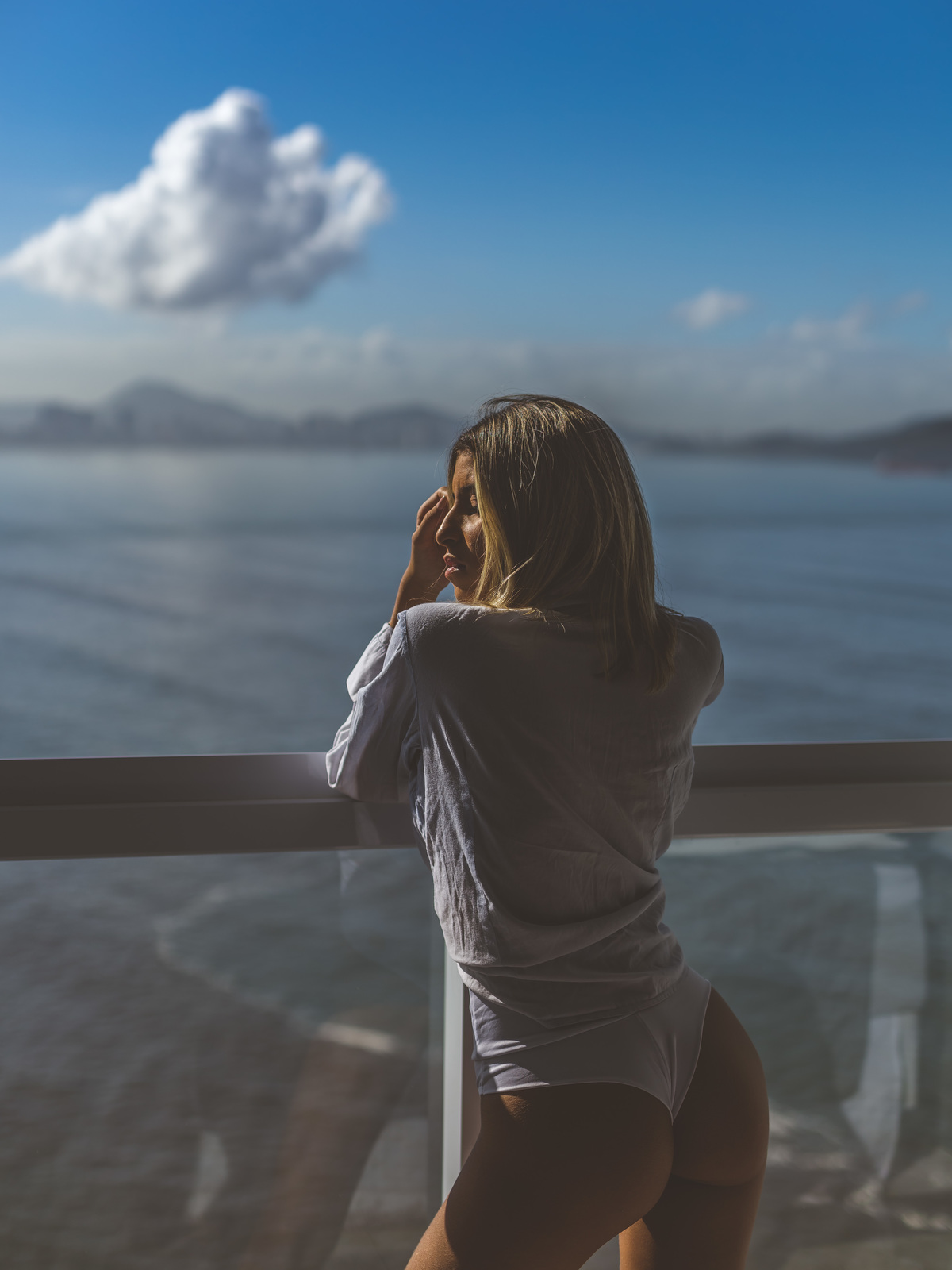 ensaio-sensual-em-sao-paulo-sp-vista-mar-ceu-nuvem