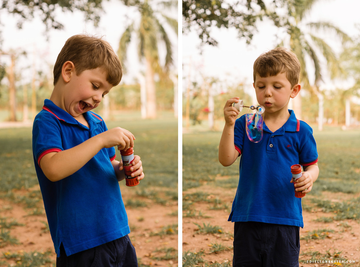 criança brincando com bolha de sabao