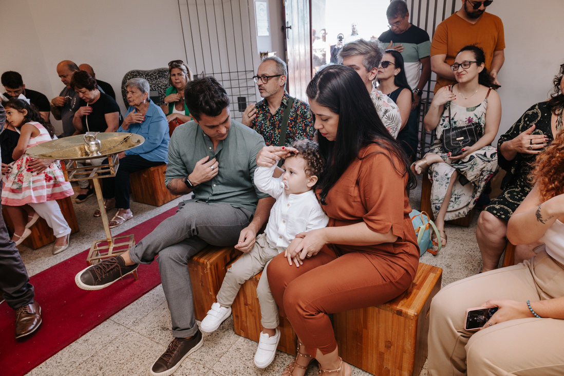 familai no batismo na capela do cristo redentos