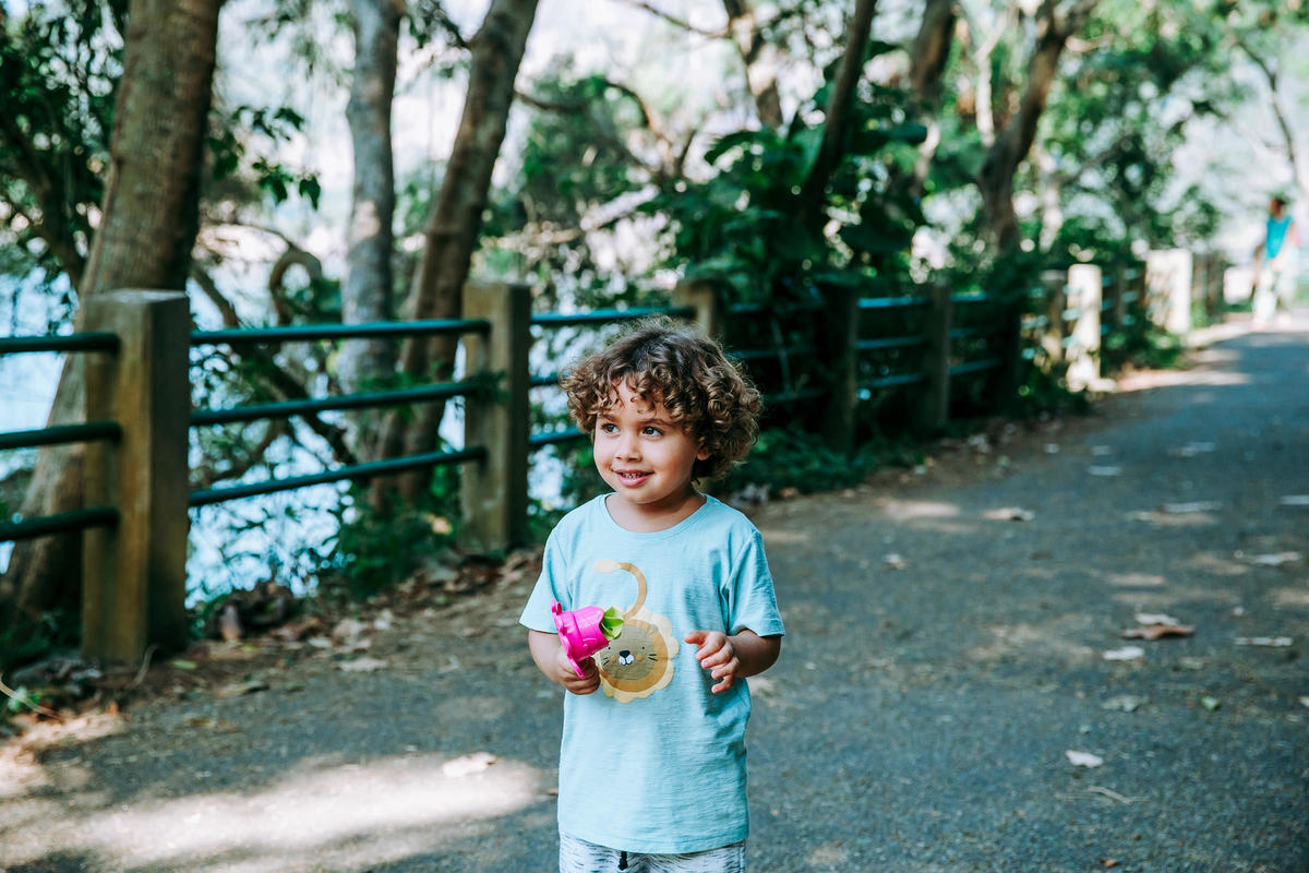 Fotografia de criança em ensaio fotográfico na Pista Claudio Coutinho no RJ