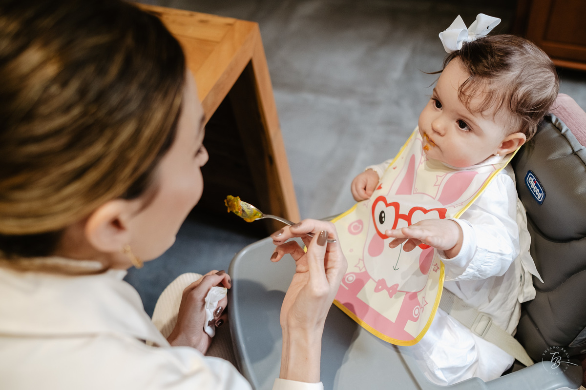 Fotografia de batizado documental em Anitápolis por Thiago Braga