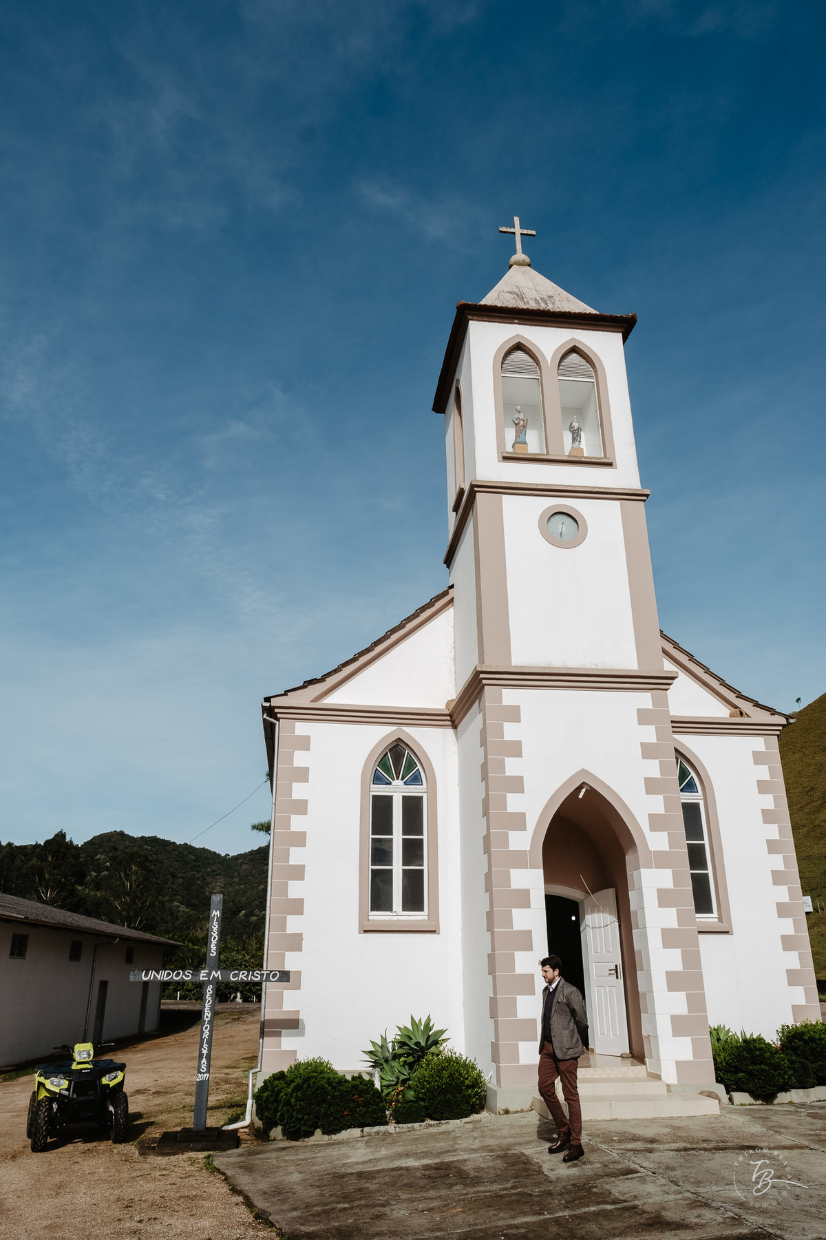 Fotografia de batizado documental em Anitápolis por Thiago Braga