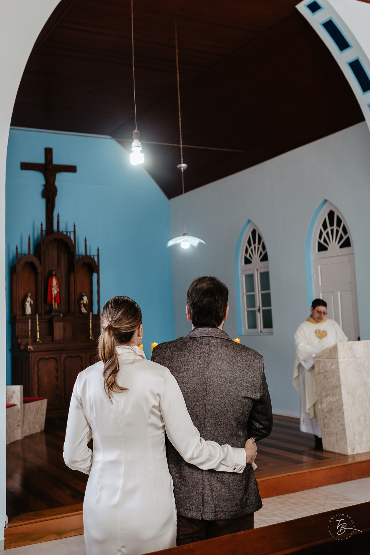 Fotografia de batizado documental em Anitápolis por Thiago Braga