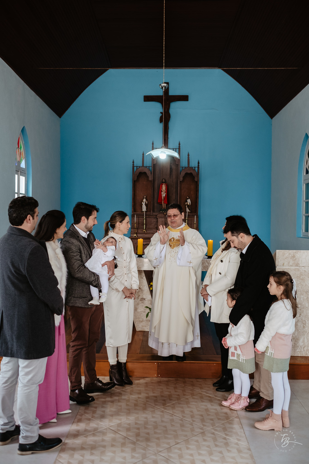 Fotografia de batizado documental em Anitápolis por Thiago Braga