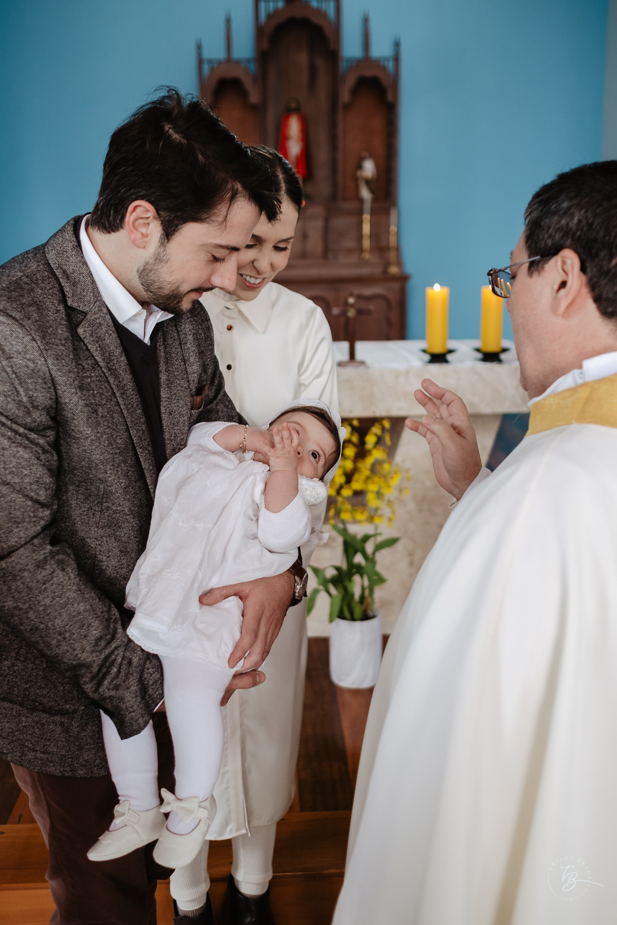 Fotografia de batizado documental em Anitápolis por Thiago Braga