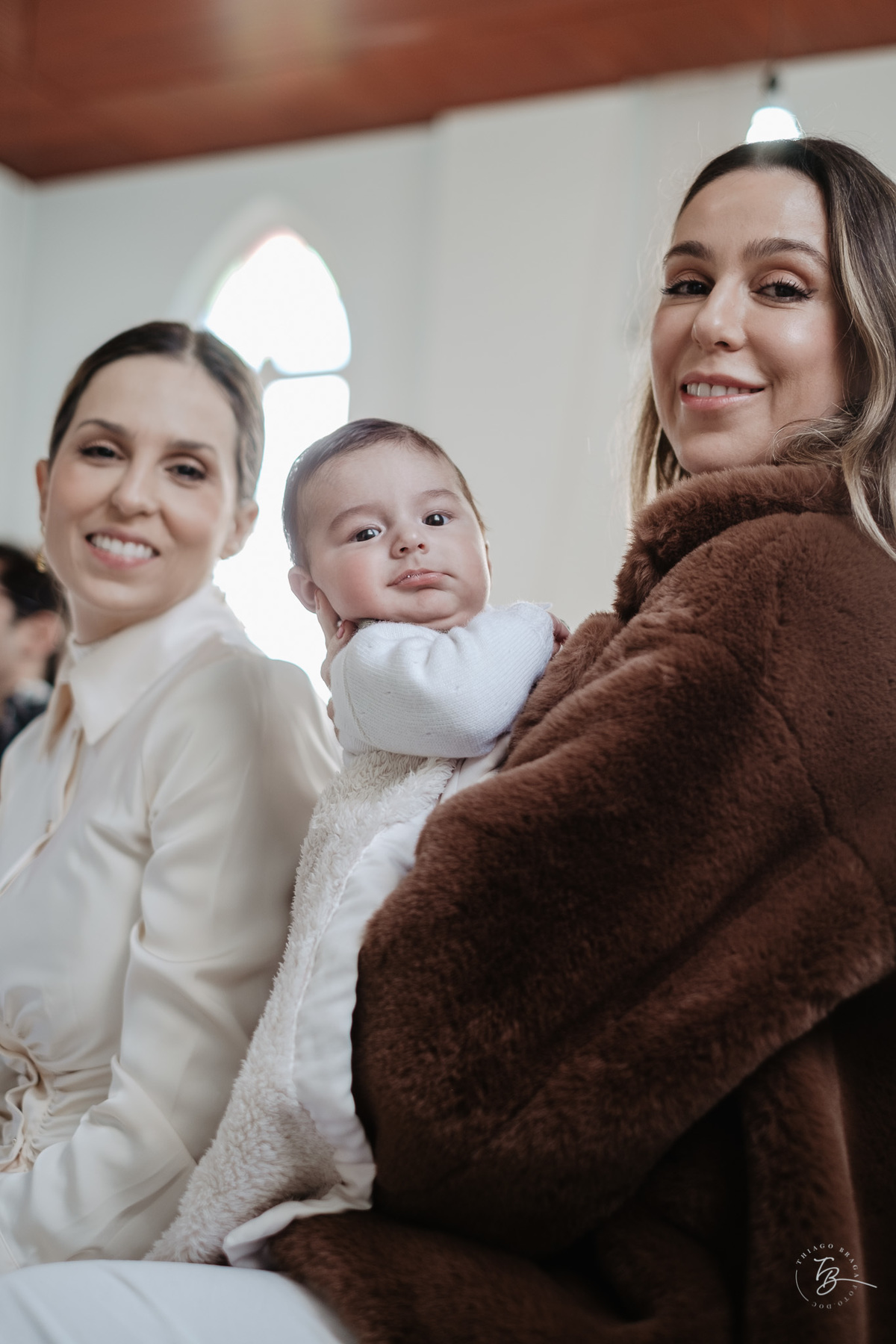 Fotografia de batizado documental em Anitápolis por Thiago Braga