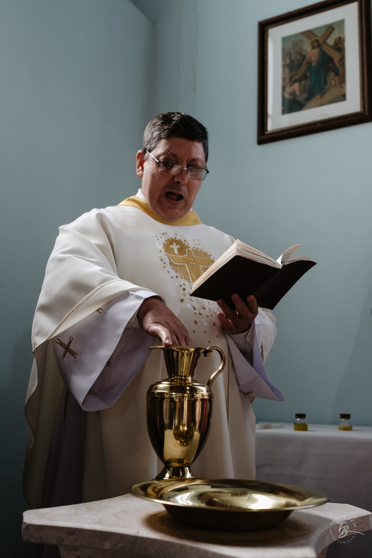 Fotografia de batizado documental em Anitápolis por Thiago Braga