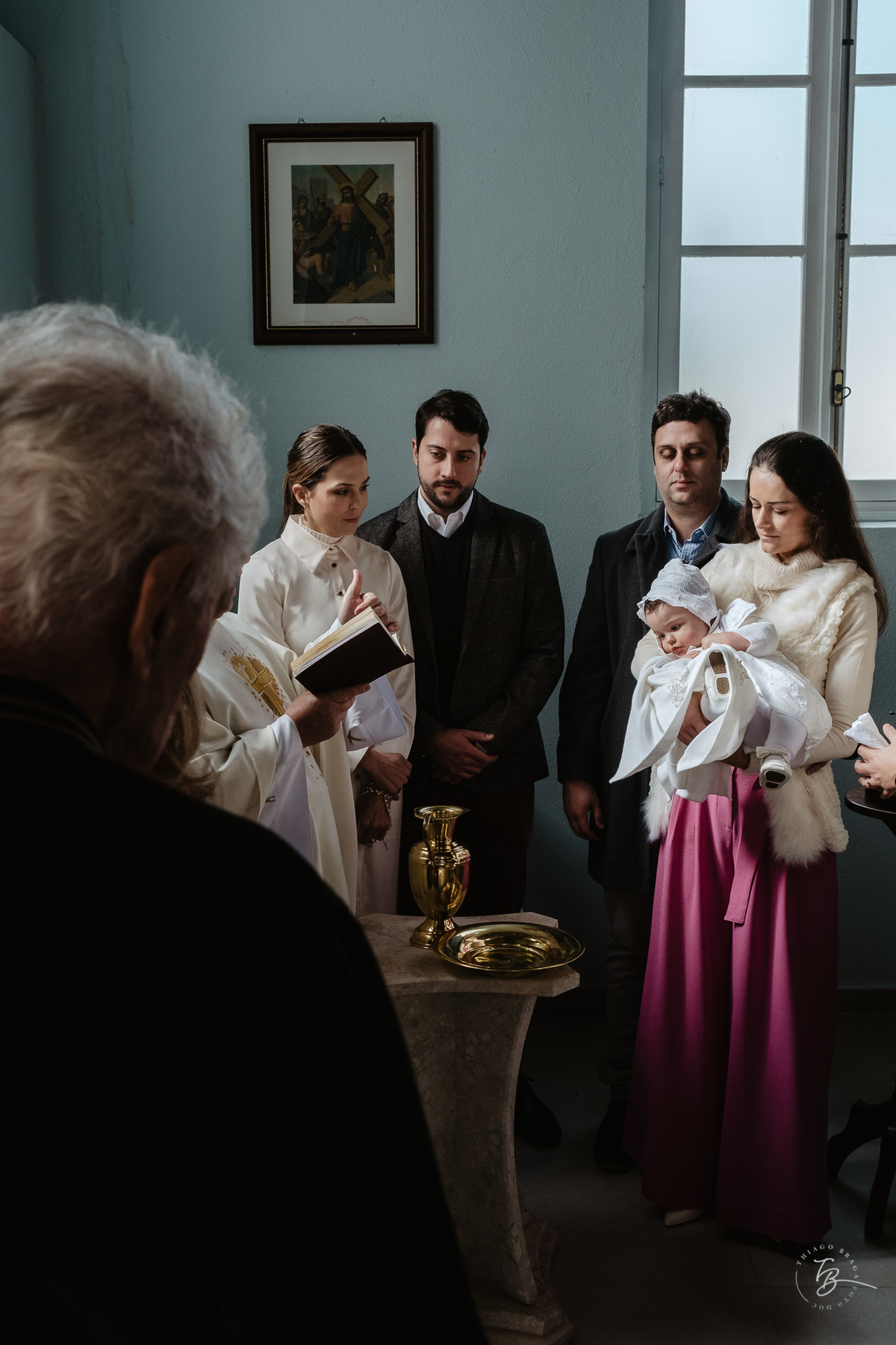 Fotografia de batizado documental em Anitápolis por Thiago Braga