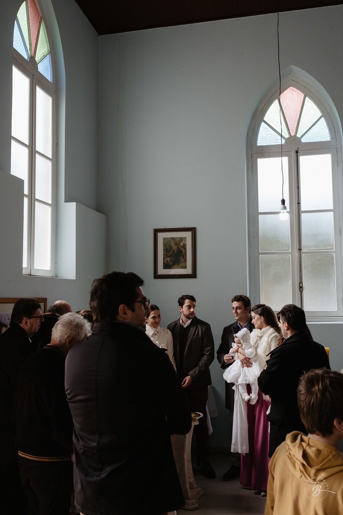 Fotografia de batizado documental em Anitápolis por Thiago Braga