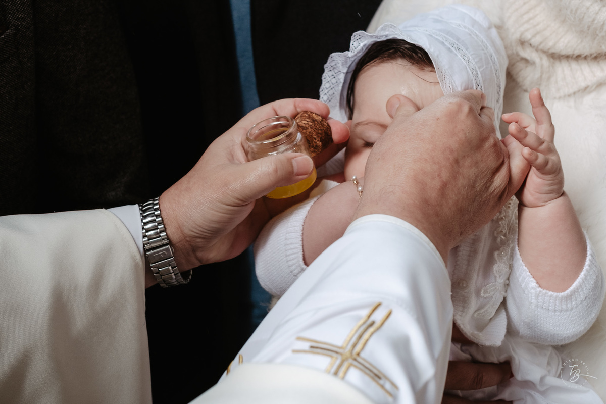 Fotografia de batizado documental em Anitápolis por Thiago Braga