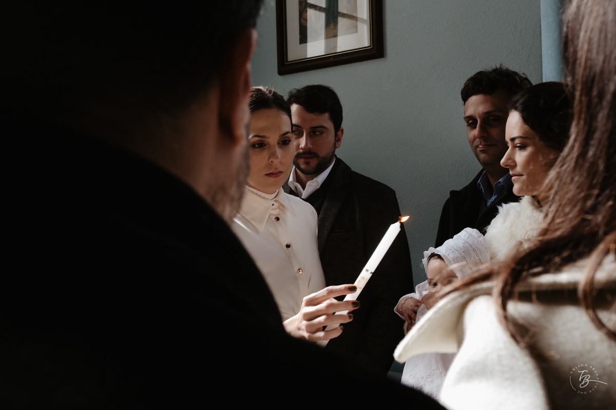 Fotografia de batizado documental em Anitápolis por Thiago Braga