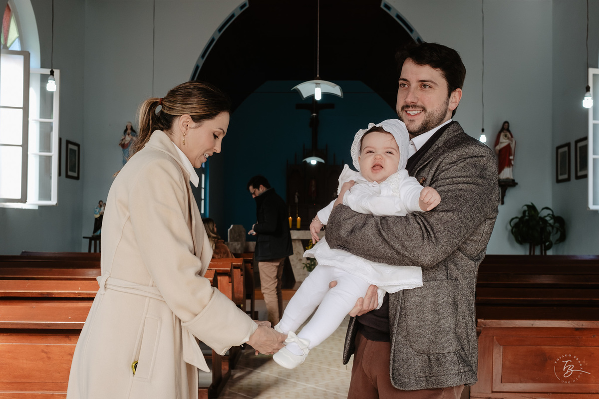 Fotografia de batizado documental em Anitápolis por Thiago Braga