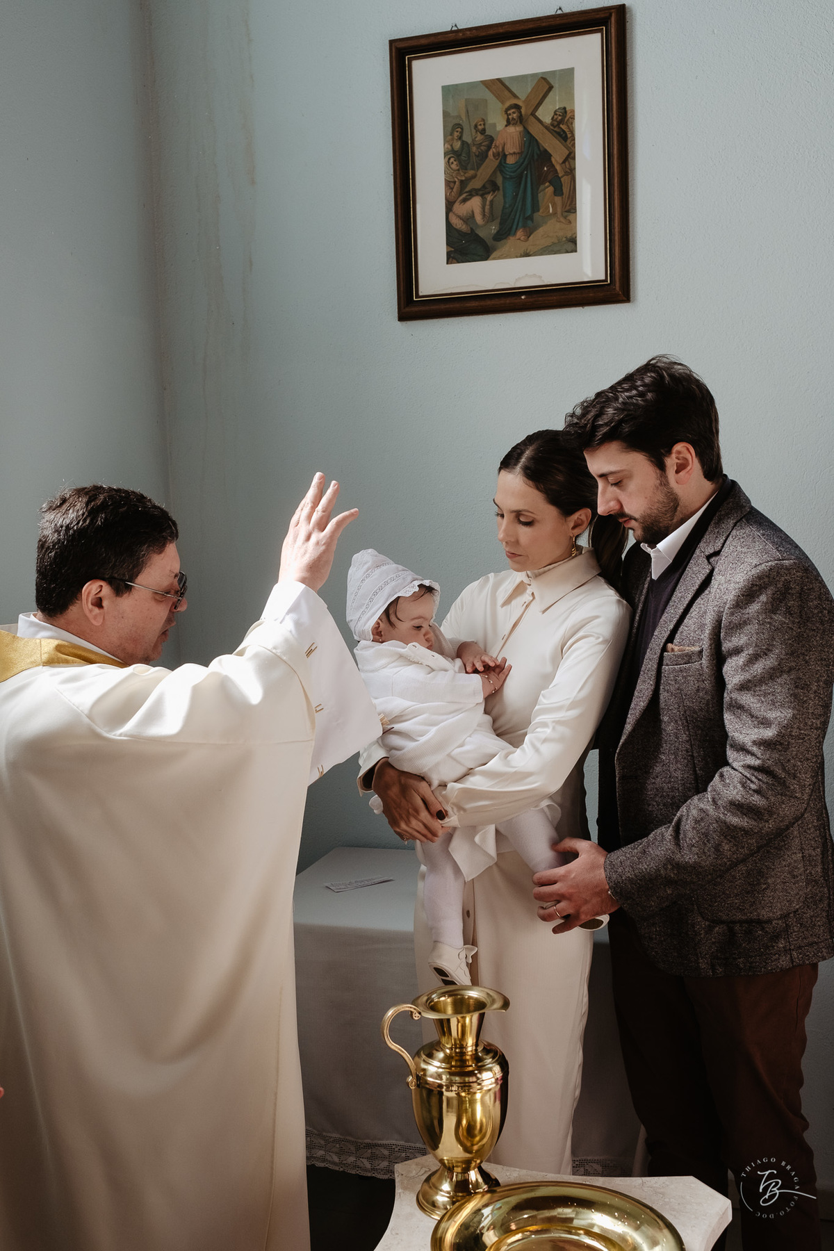 Fotografia de batizado documental em Anitápolis por Thiago Braga