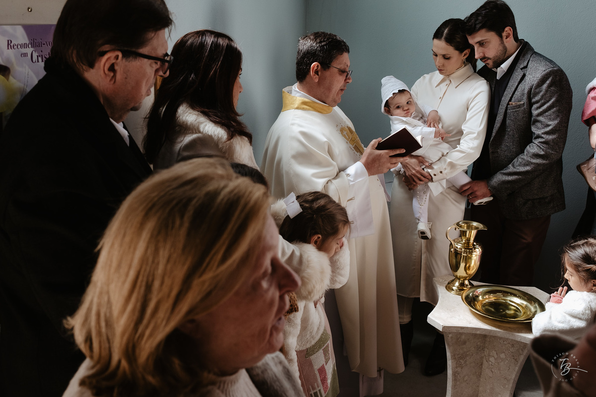 Fotografia de batizado documental em Anitápolis por Thiago Braga
