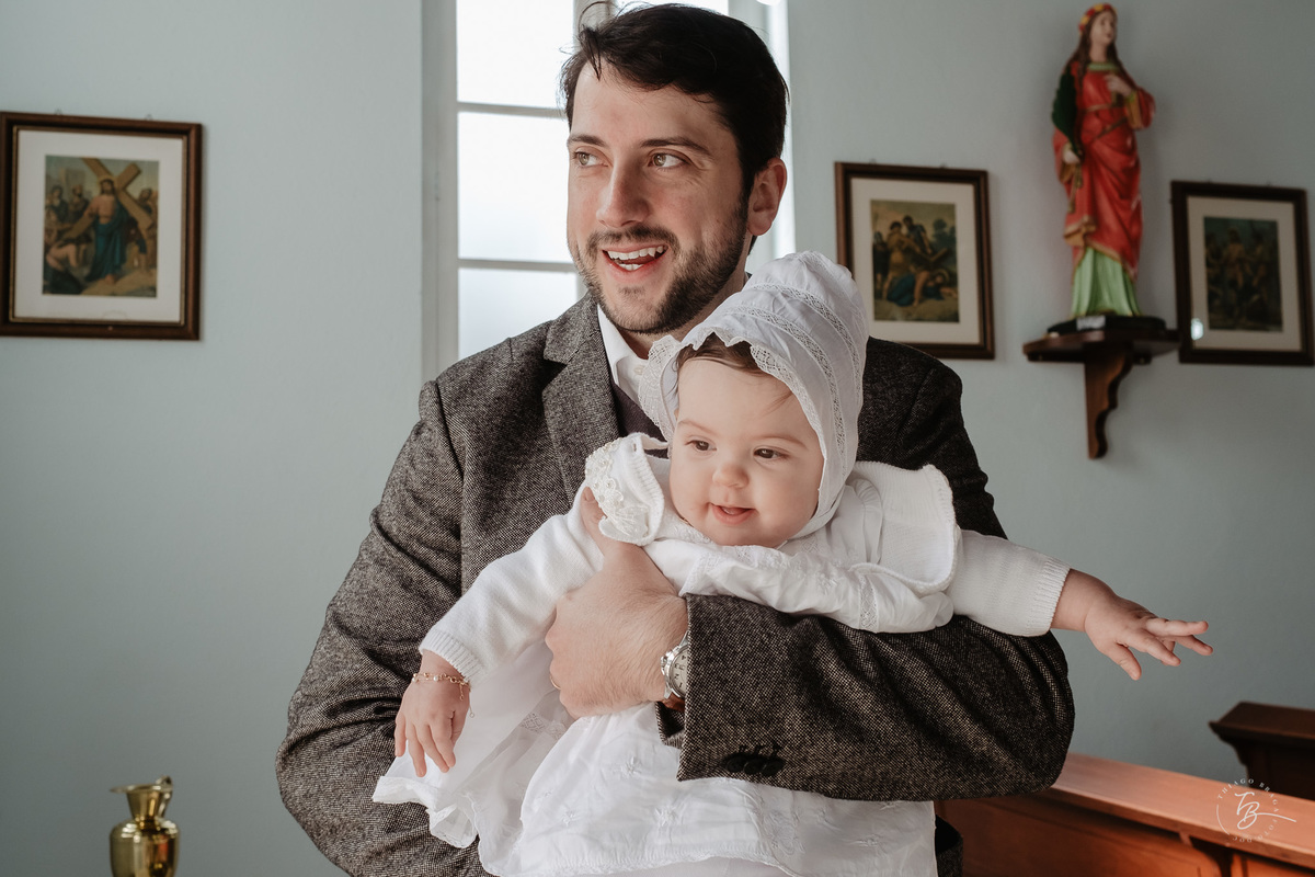 Fotografia de batizado documental em Anitápolis por Thiago Braga