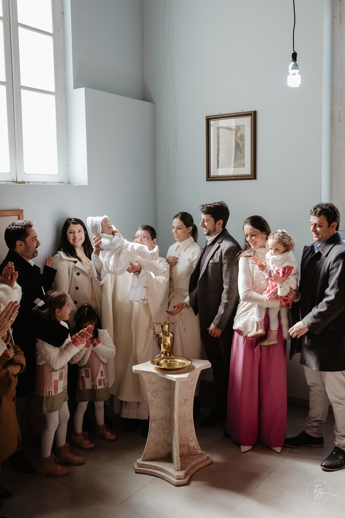 Fotografia de batizado documental em Anitápolis por Thiago Braga