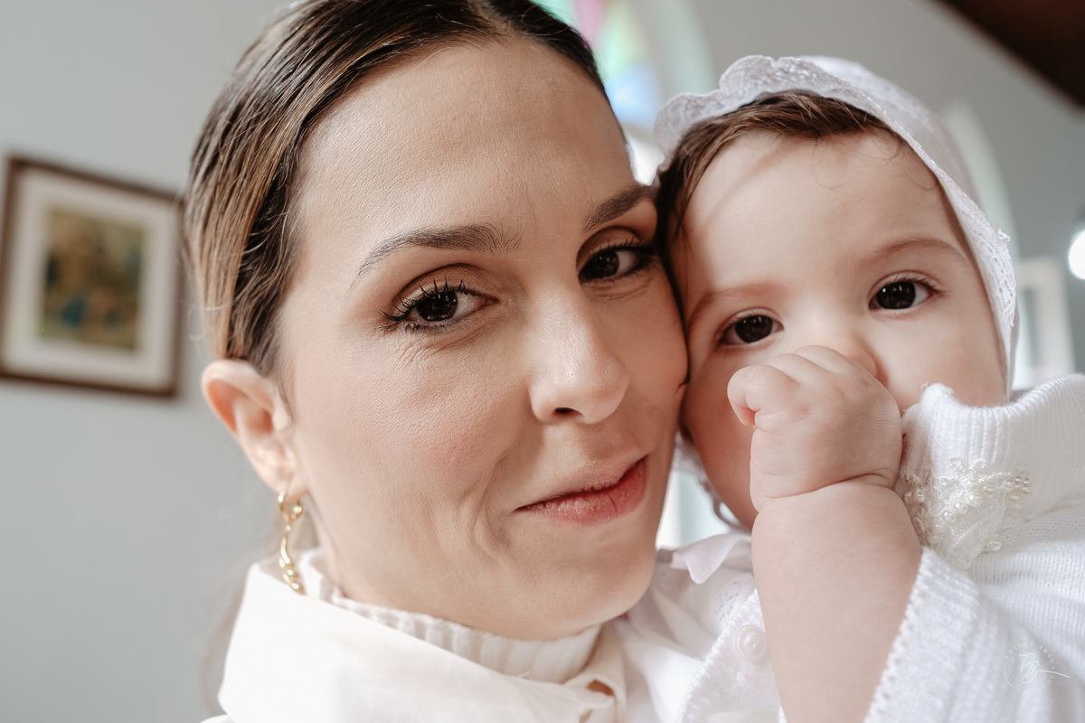 Fotografia de batizado documental em Anitápolis por Thiago Braga