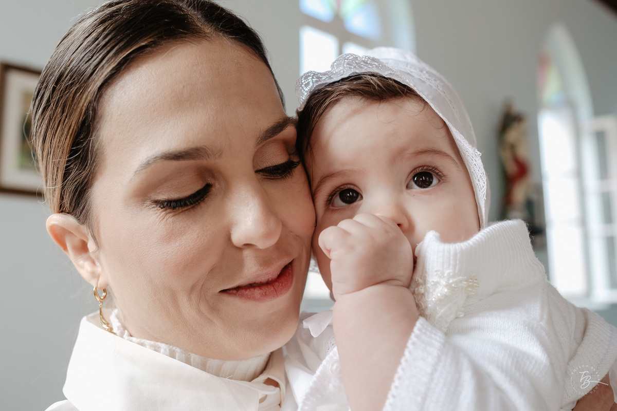 Fotografia de batizado documental em Anitápolis por Thiago Braga