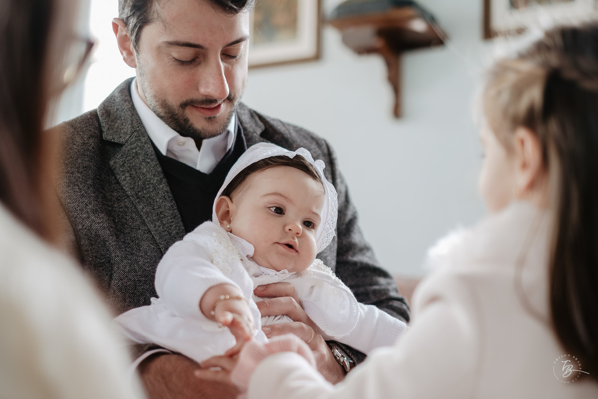 Fotografia de batizado documental em Anitápolis por Thiago Braga