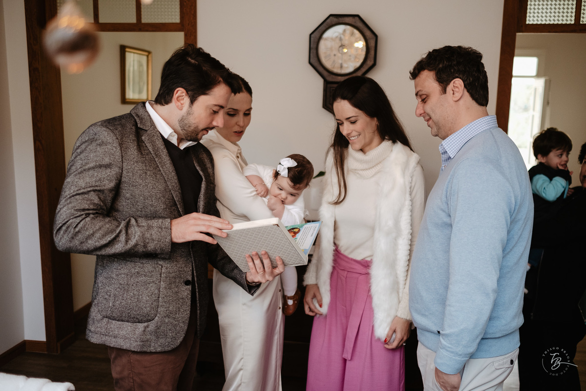 Fotografia de batizado documental em Anitápolis por Thiago Braga