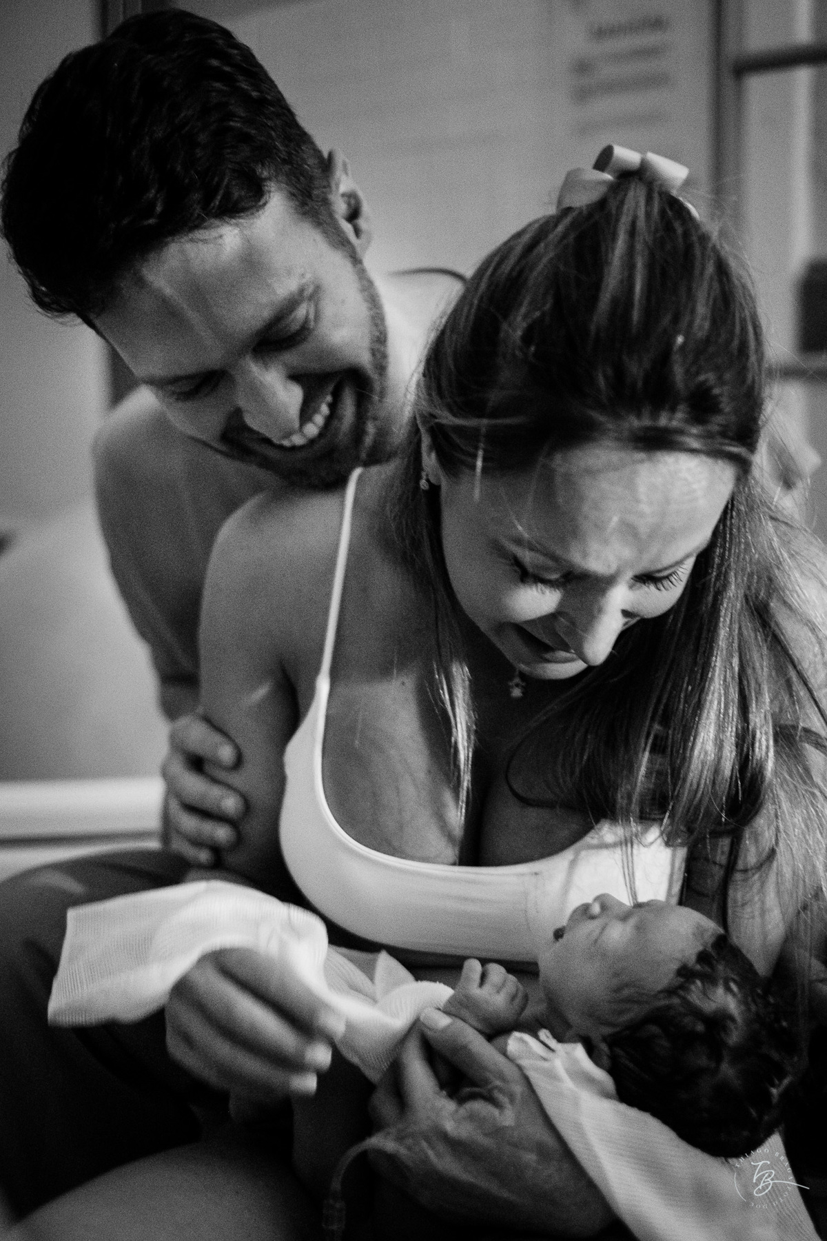 Fotografia de parto normal, na maternidade ilha por Thiago Braga