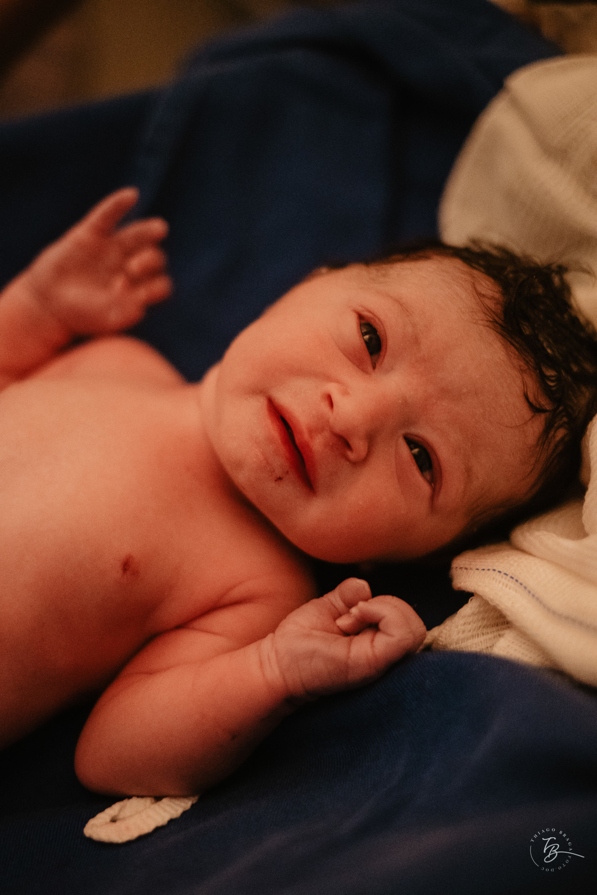 Fotografia de parto normal, na maternidade ilha por Thiago Braga