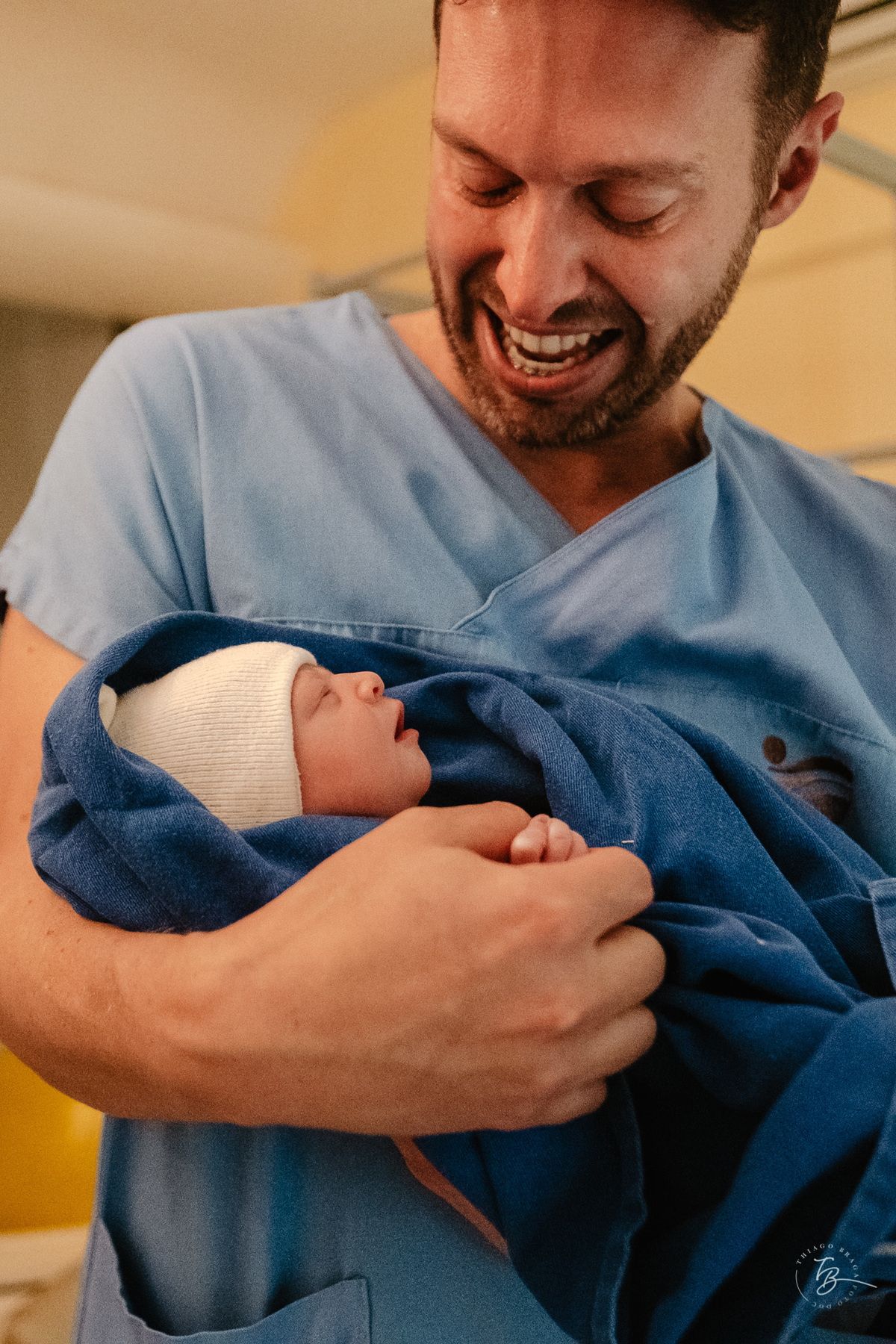 Fotografia de parto normal, na maternidade ilha por Thiago Braga