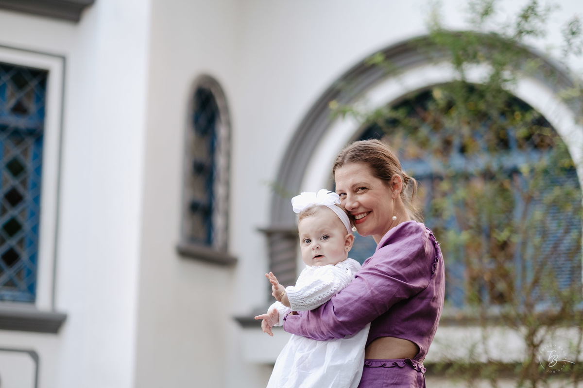 O dia do batizado da Bianca na igreja do colégio Catarinense em Florianópolis/Sc por Thiago Braga fotografia.