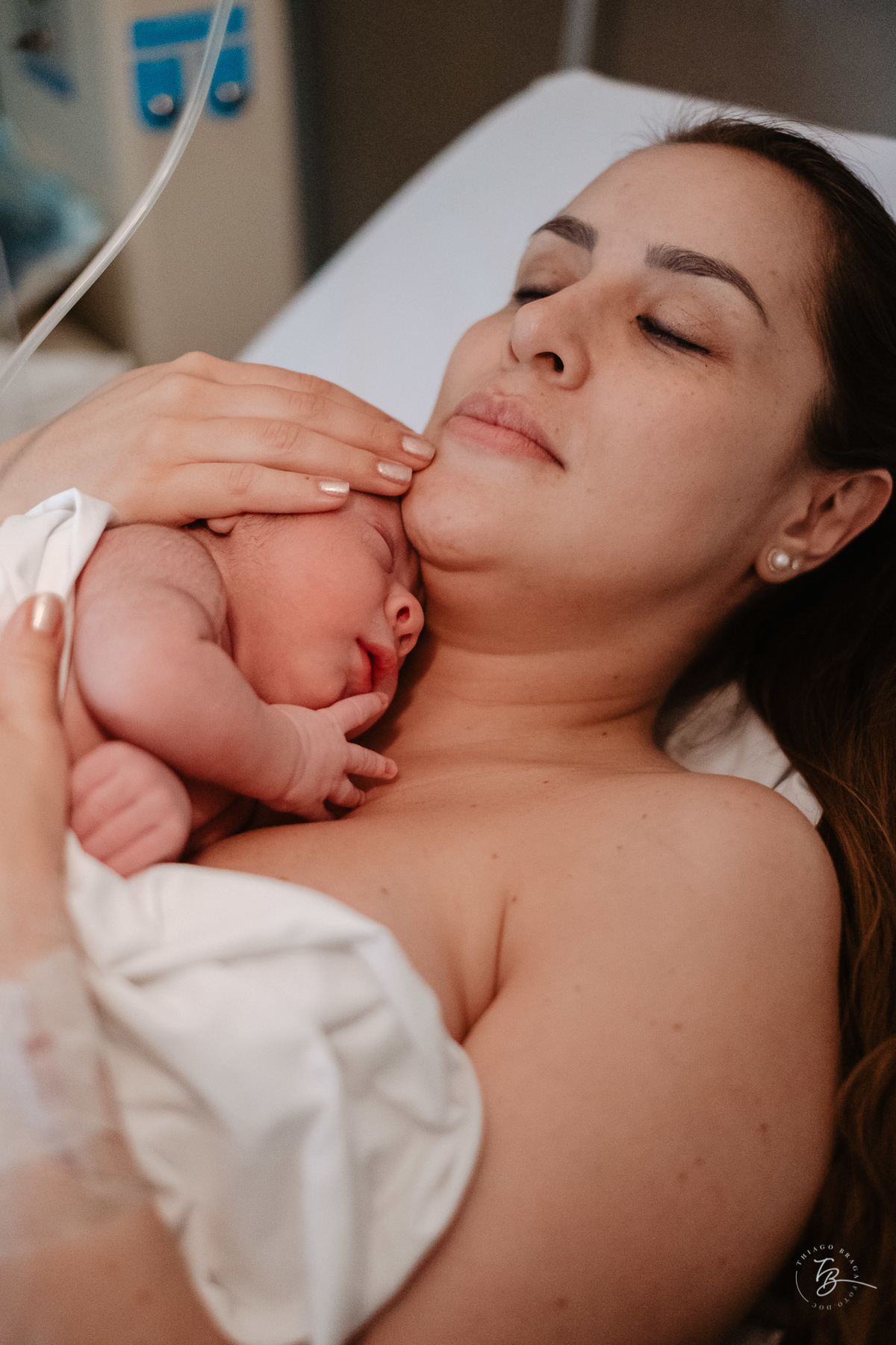 parto normal na maternidade santa helena, a chegada do enrico, por Thiago Braga Fotografia.