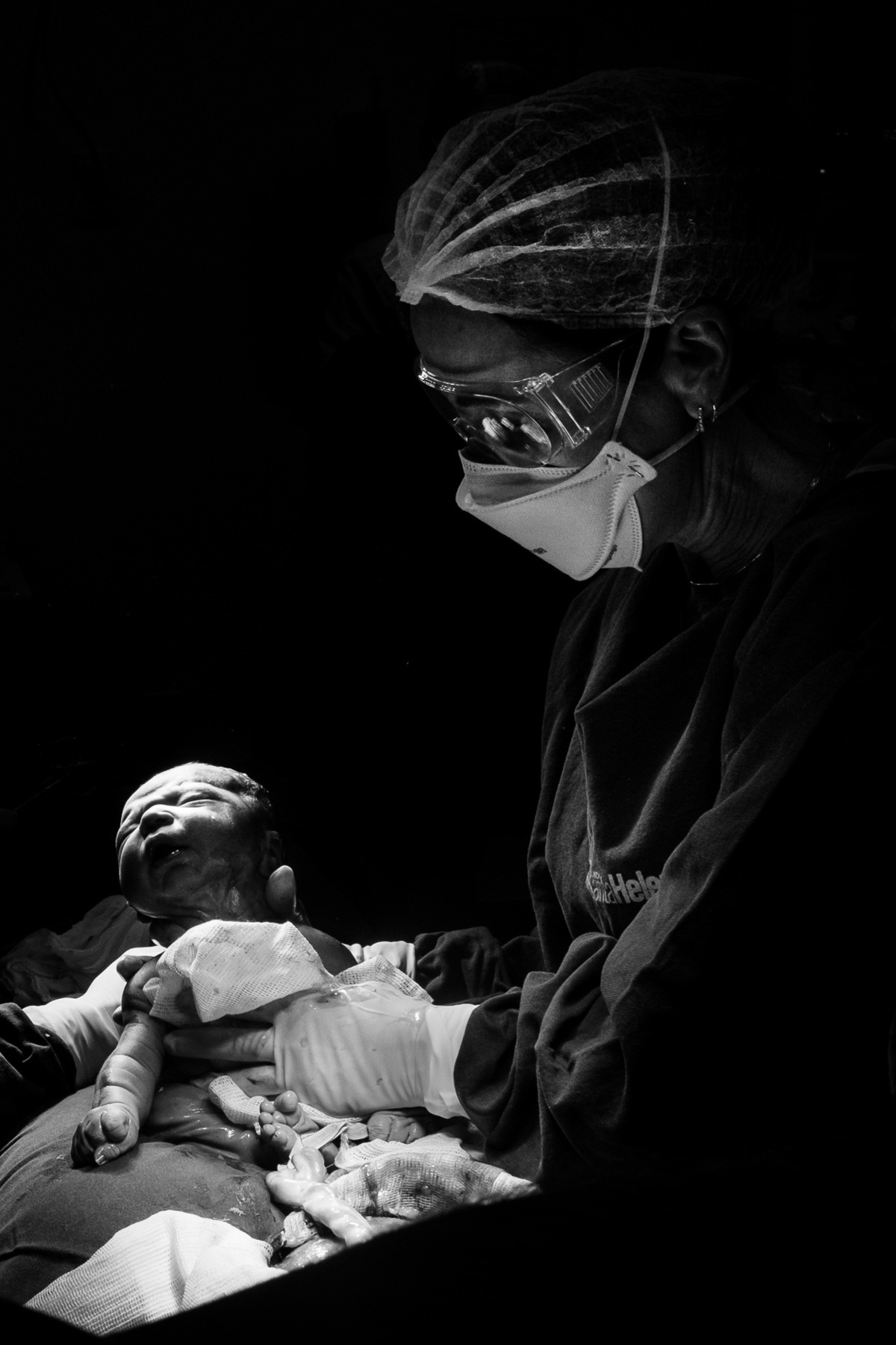 Fotos de parto e nascimento por Thiago Braga, sobre a chegada do Isaac em Florianópolis.